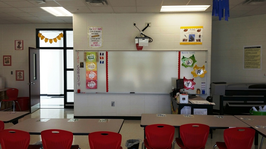 Mimio board and tables in the LES art room. 