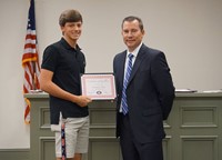 LHS baseball player with superintendent