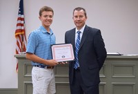 LHS baseball player with superintendent