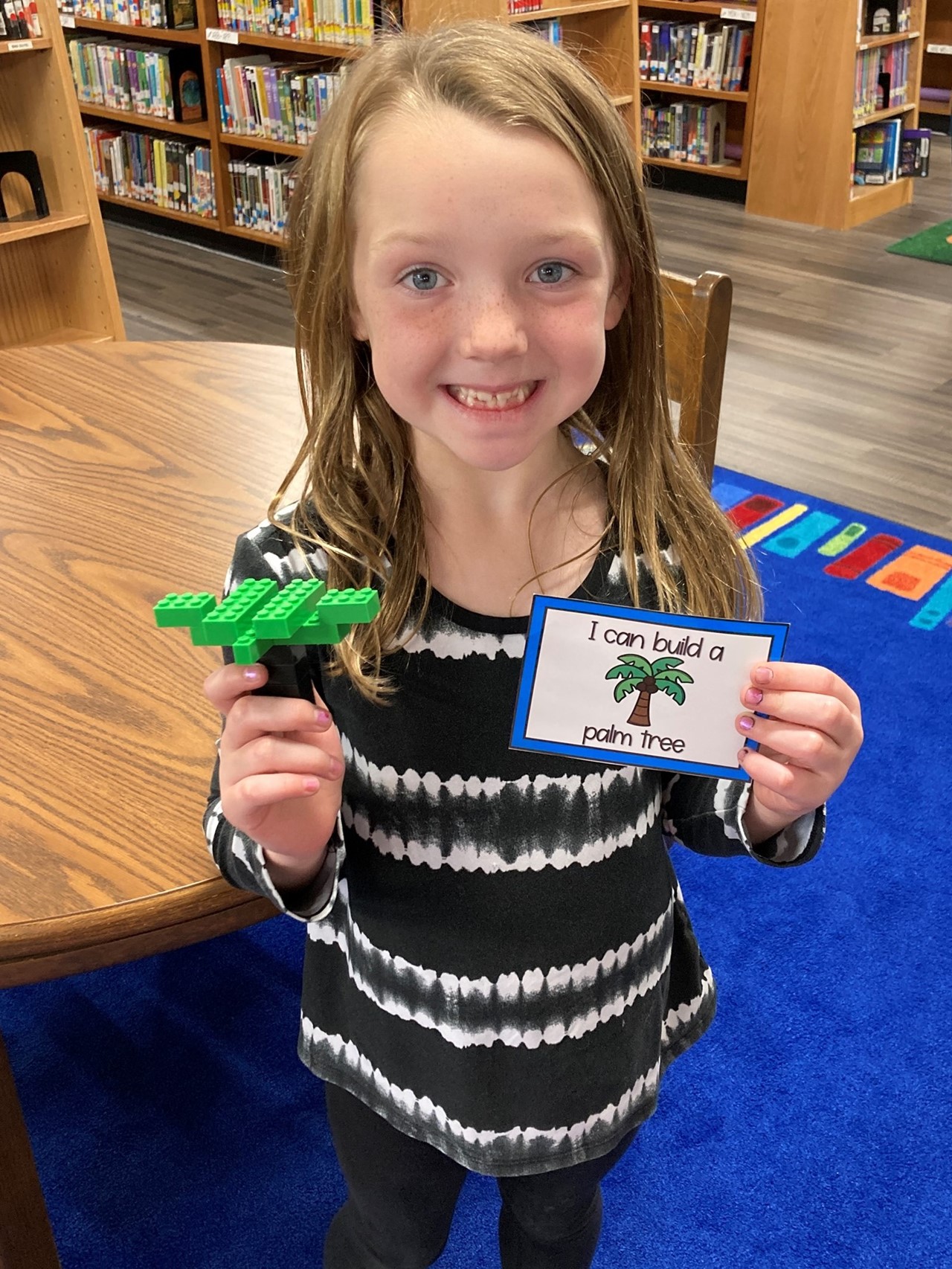 Student with a Lego creation