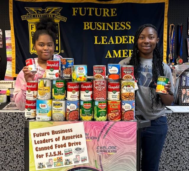 Canned Food Drive for F.I.S.H. (pictured Fantasia Hopkins, Nicole Baynes) 